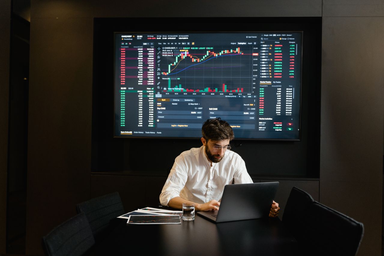 Investor comparing trading platforms and their key features.