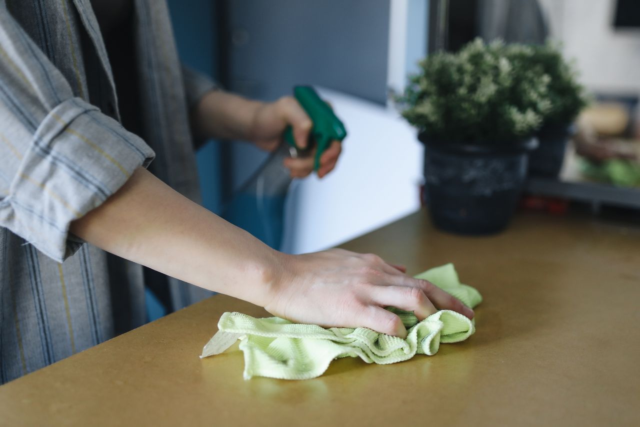 Professional cleaner working inside a commercial property