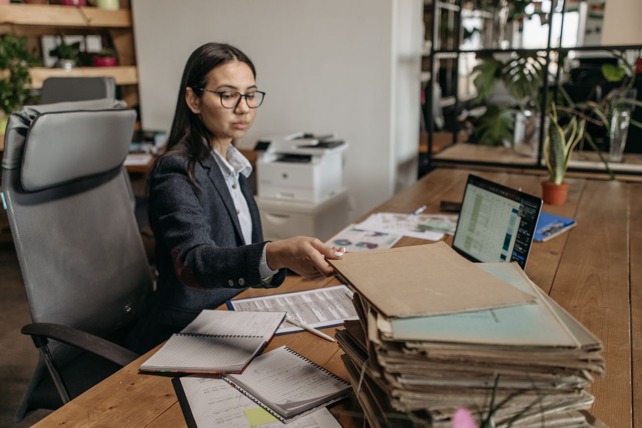 Business professionals evaluating M-Files document management solutions